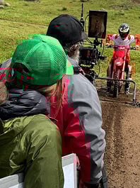 Filming motocross rider